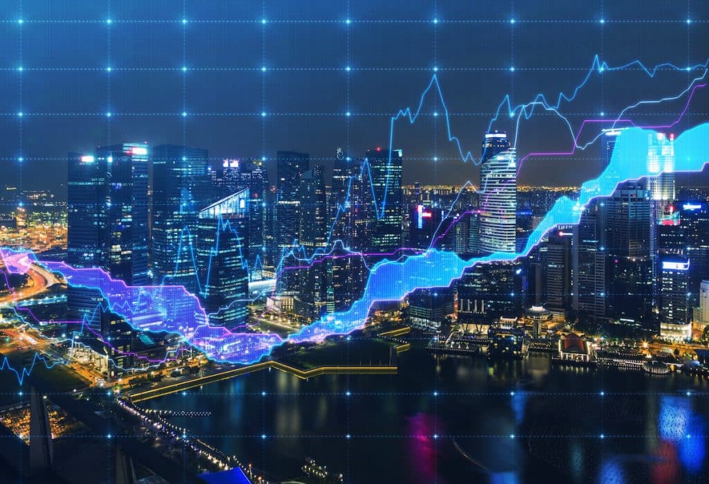 A financial chart overlaid on a photo of New York City at night